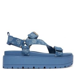 Sandały Guess. Niebieskie sandały damskie Guess, z aplikacjami, bez obcasa, na płaskiej podeszwie, bez zapięcia. Za 559.99 zł.