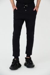 BALMAIN Czarne męskie spodnie dresowe Ribbed Flock Sweatpants, Rozmiar L. Czarne spodnie sportowe męskie Balmain, l, bez wzorów, z dresówki. W wyprzedaży za 2,199.99 zł.