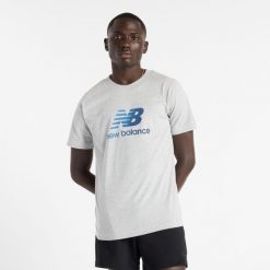 Koszulka męska New Balance MT51503AG – szara. Szare koszulki sportowe męskie New Balance, m, bez wzorów, z dresówki, bez ramiączek. Za 79.99 zł.