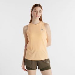 Koszulka damska New Balance WT41280PAE – pomarańczowa. Brązowe bluzki damskie New Balance, s, bez wzorów, z materiału, sportowe, bez kołnierzyka, bez ramiączek. Za 99.99 zł.