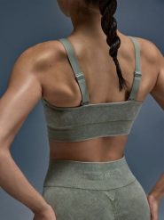 4F Biustonosz do jogi i pilatesu ze średnim wsparciem damski - zielony M/L. Zielone bielizna sportowa damska 4F, l, bez wzorów, z gumy. Za 119.99 zł.