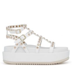 Sandały Badura. Białe sandały damskie Badura, bez wzorów, bez obcasa, na koturnie, bez zapięcia. Za 229.99 zł.