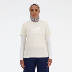 Koszulka damska New Balance WT41502LIN – beżowa. Brązowe koszulki sportowe damskie New Balance, s, bez wzorów, z materiału, bez ramiączek. Za 119.99 zł.