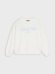 Bluza z napisem - kremowy. Białe bluzy damskie Sinsay, l, bez wzorów, bez ramiączek, bez kaptura. W wyprzedaży za 19.99 zł.