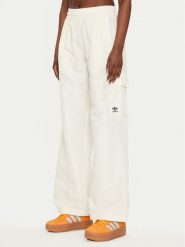 Adidas Spodnie dresowe Essentials Woven Cargo IX9970 Écru Loose Fit. Spodnie dresowe damskie Adidas, bez wzorów, z dresówki. Za 179.99 zł.