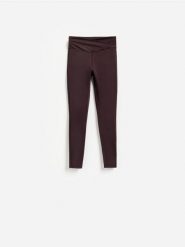 Gładkie legginsy - ciemnofioletowy. Fioletowe legginsy damskie Reserved, bez wzorów, z dzianiny. Za 89.99 zł.