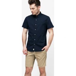 Timberland Koszula Ss Eastham River Stretch Poplin Shirt Sli , granatowy, rozmiar L. Niebieskie koszule męskie Timberland, na lato, l, bez wzorów, z bawełny, bez kołnierzyka, bez ramiączek. W wyprzedaży za 159.99 zł.