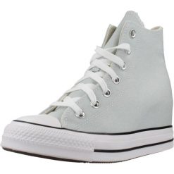 Buty CONVERSE CHUCK TAYLOR ALL STAR WEDGE Niebieski. Niebieskie obuwie sportowe damskie Converse, bez wzorów, z tkaniny, bez zapięcia. Za 369.99 zł.