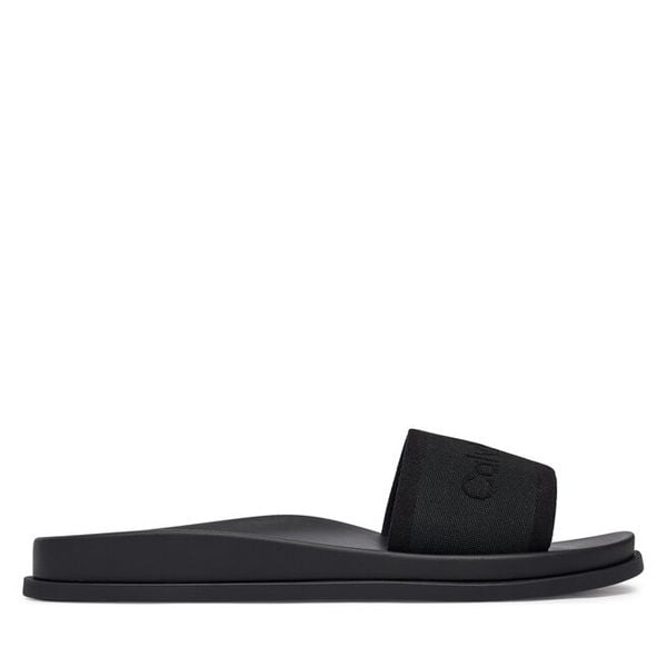 Klapki Calvin Klein. Czarne klapki damskie Calvin Klein, bez wzorów, bez obcasa, bez zapięcia. Za 295.99 zł.
