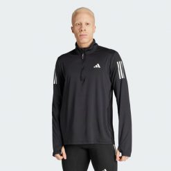 Kurtka Own the Run Half-Zip. Czarne kurtki męskie Adidas, xl, bez wzorów, z materiału, sportowe, bez kaptura. W wyprzedaży za 170.82 zł.