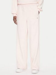 Calvin Klein Jeans Spodnie dresowe LV047C249G Różowy Regular Fit. Czerwone spodnie dresowe damskie Calvin Klein Jeans, bez wzorów, z bawełny. Za 279.99 zł.