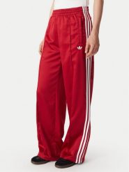 Adidas Spodnie dresowe Satin Sst Loose Trackpant KS7338 Czerwony Relaxed Fit. Czerwone spodnie dresowe damskie Adidas, bez wzorów, z dresówki. Za 349.99 zł.