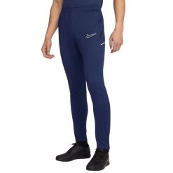 Nike Męskie spodnie dresowe Dri-FIT Academy 25 - dopasowany krój, kieszenie. Niebieskie spodnie sportowe męskie Nike, m, bez wzorów, z dresówki, do piłki nożnej, dri-fit (nike). Za 141.99 zł.