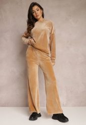 Beżowe Spodnie Dresowe Szerokie z Weluru Dilko. Brązowe spodnie dresowe damskie Renee, bez wzorów, z dresówki, eleganckie. Za 59.99 zł.