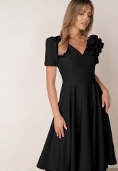 Czarna Elegancka Rozkloszowana Sukienka z Kwiatem 3D Eugorus. Czarne sukienki damskie Born2be, na imprezę, l, z aplikacjami, eleganckie, bez kołnierzyka, bez ramiączek, midi, dopasowane. Za 249.99 zł.