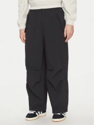 Adidas Spodnie materiałowe Premium Essentials Utility Parachute JD2111 Czarny Loose Fit. Czarne spodnie materiałowe męskie Adidas, bez wzorów, z materiału. Za 259.99 zł.