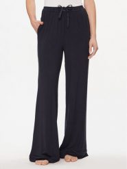 Tommy Hilfiger Spodnie dresowe UW0UW05195 Granatowy Relaxed Fit. Niebieskie spodnie dresowe damskie Tommy Hilfiger, bez wzorów, z dresówki. Za 229.99 zł.