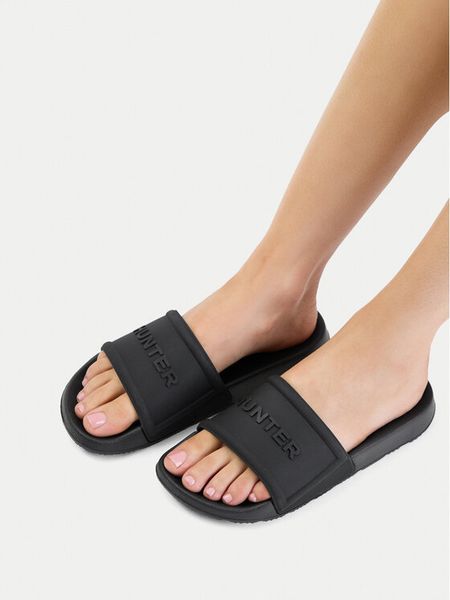 Hunter Klapki CEO-3C048 Czarny. Czarne klapki damskie Hunter, bez wzorów, z syntetyku, bez obcasa, bez zapięcia. Za 119.99 zł.