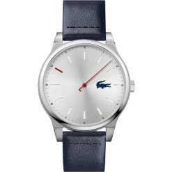 Zegarek kwarcowy "Kyoto" w kolorze granatowo-srebrnym. Niebieskie, analogowe zegarki męskie Tommy Hilfiger & Lacoste, bez wzorów, ze skóry, srebrne. W wyprzedaży za 482.95 zł.