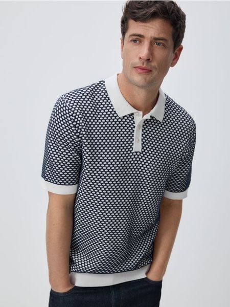 Bawełniany sweter polo - granatowy. Niebieskie swetry męskie Reserved, l, bez wzorów, z bawełny, bez kołnierzyka, bez ramiączek. W wyprzedaży za 59.99 zł.