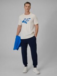 4F Spodnie dresowe joggery męskie - granatowe M. Niebieskie spodnie materiałowe męskie 4F, bez wzorów, z dresówki. Za 159.99 zł.