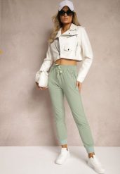 Jasnozielone Spodnie Dresowe z Bawełny High Waist Ozdobione Kieszeniami na Suwak Fedela. Zielone spodnie dresowe damskie Renee, bez wzorów, z bawełny, eleganckie, z podwyższonym stanem, długie. Za 49.99 zł.