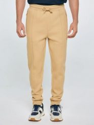 Spodnie męskie dresowe beżowe Wladorp 801. Brązowe spodnie materiałowe męskie BIG STAR, bez wzorów, z dresówki. Za 199.99 zł.