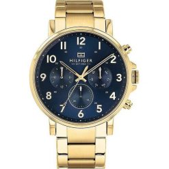 Zegarek Tommy Hilfiger Zegarek Męski Tommy Hilfiger 1710384 Złota bransoleta. Żółte zegarki męskie Tommy Hilfiger, bez wzorów, złote. Za 1,240.98 zł.