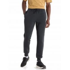 Spodnie dresowe męskie NEW BALANCE bawełniane. Czarne spodnie sportowe męskie New Balance, m, bez wzorów, z bawełny. Za 239.00 zł.