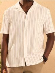 Luźna koszula w paski - kremowy. Białe koszule męskie Sinsay, l, bez wzorów, bez kołnierzyka, bez ramiączek. Za 59.99 zł.