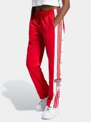 Adidas Spodnie dresowe Adibreak IP0620 Czerwony Regular Fit. Czerwone spodnie sportowe damskie Adidas, bez wzorów, z dresówki. Za 219.99 zł.