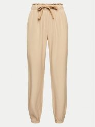 Deha Spodnie dresowe A00667 Beżowy Regular Fit. Brązowe spodnie dresowe damskie Deha, bez wzorów, z dresówki. Za 289.99 zł.