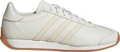 Adidas Buty damskie adidas Runvista białe JR4626 40. Białe obuwie sportowe damskie Adidas, bez wzorów, bez zapięcia. Za 279.71 zł.