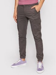Jack & Jones Spodnie materiałowe Paul 12140326 Szary Tapered Fit. Szare spodnie materiałowe męskie Jack & Jones, bez wzorów, z bawełny. Za 229.99 zł.