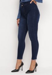 Niebieskie Jeansy Skinny z Postrzępionymi Nogawkami Nogoi. Niebieskie jeansy damskie Born2be, bez wzorów, z jeansu. Za 59.99 zł.