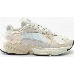 Sneakersy damskie beżowe Adidas Yung 1 CG7118 - beżowy. Brązowe obuwie sportowe damskie Adidas, bez wzorów, bez zapięcia. Za 499.99 zł.