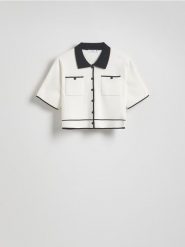 Sweter z kontrastowymi wstawkami - złamana biel. Swetry nierozpinane damskie Reserved, l, bez wzorów, z tkaniny, bez kołnierzyka, bez ramiączek. W wyprzedaży za 69.99 zł.