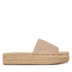 Klapki Calvin Klein. Brązowe klapki damskie Calvin Klein, bez wzorów, bez obcasa, bez zapięcia. Za 258.99 zł.
