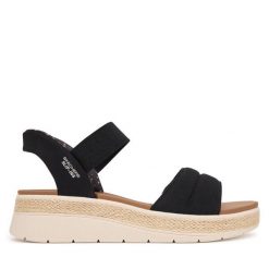 Sandały Skechers. Brązowe sandały damskie Skechers, bez wzorów, bez obcasa, na koturnie, bez zapięcia. Za 359.99 zł.