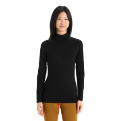 Koszulka z długim rękawem Damska Icebreaker 260 Tech LS Turtleneck. Czarne bluzki damskie Icebreaker, xs, bez wzorów, z wełny, sportowe, bez kołnierzyka, bez ramiączek. Za 510.45 zł.