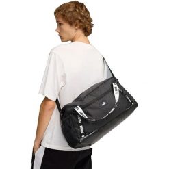 Torba Puma Phase Tape Small Sports Bag 22L. Czarne torby sportowe męskie Puma, bez wzorów, z materiału. Za 290.00 zł.