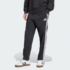 Spodnie Essentials 3-Stripes Stanford Open Hem. Białe buty sportowe męskie Adidas, bez wzorów, z materiału, bez zapięcia, na fitness i siłownię. W wyprzedaży za 143.20 zł.