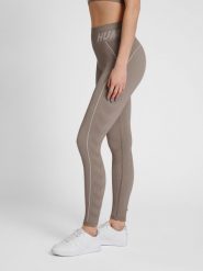 Damskie legginsy ze średnim stanem Hummel TE Christel. Szare legginsy damskie Hummel, bez wzorów, z dzianiny. Za 184.00 zł.