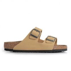 Klapki damskie Birkenstock Arizona. Żółte klapki damskie Birkenstock, na lato, bez wzorów, z materiału, eleganckie, bez obcasa, bez zapięcia. Za 425.35 zł.