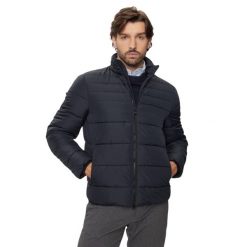 Kurtka puchowa zapinana na zamek Geox Magnete. Niebieskie kurtki męskie Geox, m, bez wzorów, z puchu, bez kaptura. W wyprzedaży za 556.00 zł.