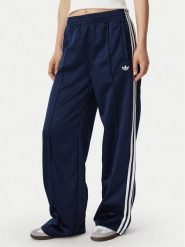 Adidas Spodnie dresowe Satin Sst Loose Trackpant KS7339 Granatowy Relaxed Fit. Niebieskie spodnie dresowe damskie Adidas, bez wzorów, z dresówki. Za 349.99 zł.