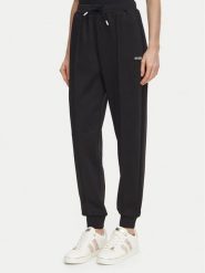 Guess Spodnie dresowe V6BB17 K6344 Czarny Regular Fit. Czarne spodnie dresowe damskie Guess, z aplikacjami, z dresówki. Za 292.99 zł.