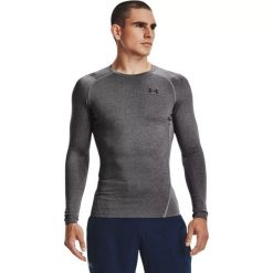 Koszulka męska treningowa szara Under Armour HeatGear Armour LongSleeve. Szare koszulki sportowe męskie Under Armour, m, bez wzorów, z elastanu, bez ramiączek, na fitness i siłownię. Za 119.99 zł.