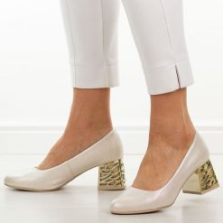 Złote mar. Polskie czółenka damskie Suzana 594. Żółte czółenka damskie Suzana, na jesień, bez wzorów, ze skóry, eleganckie, z okrągłym noskiem, bez obcasa, na obcasie, bez zapięcia. Za 249.00 zł.