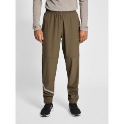 Jogging Newline Portland. Brązowe spodnie sportowe męskie Newline, m, bez wzorów, z dresówki, do biegania. Za 258.50 zł.